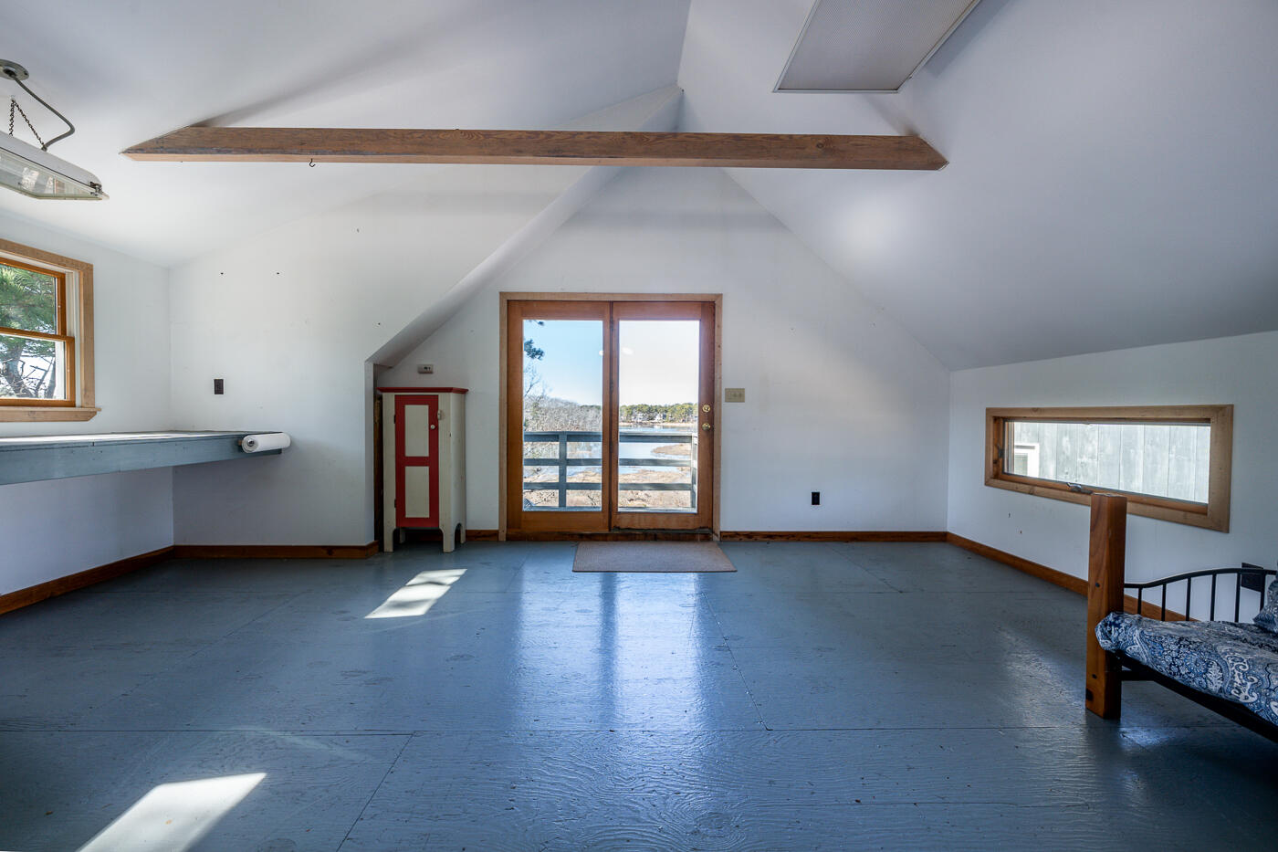 210 Lieutenant Island Road Wellfleet, MA 02667 - Photo 39 of 47 a view of an empty room with a window and wooden floor