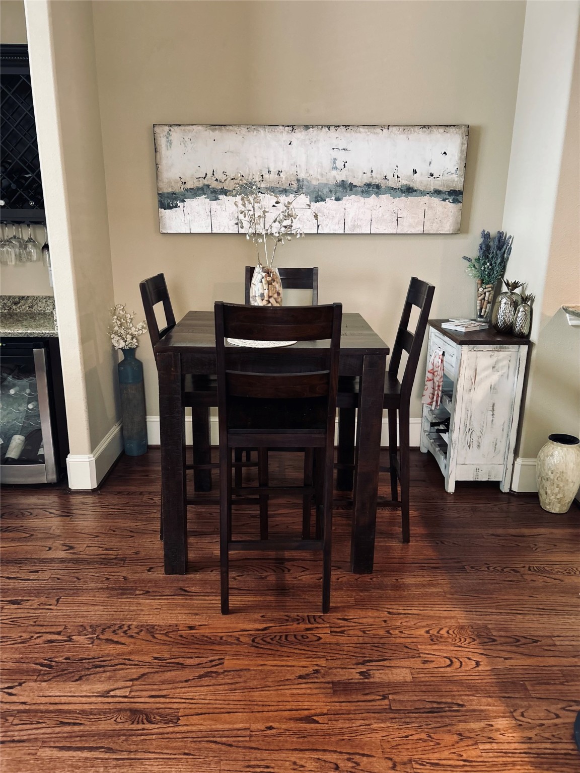 1049 West 22nd Street, Unit H Houston, TX 77008 - Photo 19 of 43 a view of a dining room with furniture and wooden floor
