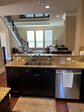 a work room with furniture and a window