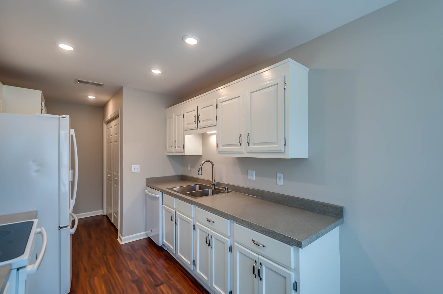 1302 General George Patton Road Nashville, TN 37221 - Photo 3 of 14 a kitchen that has a sink and a stove top oven