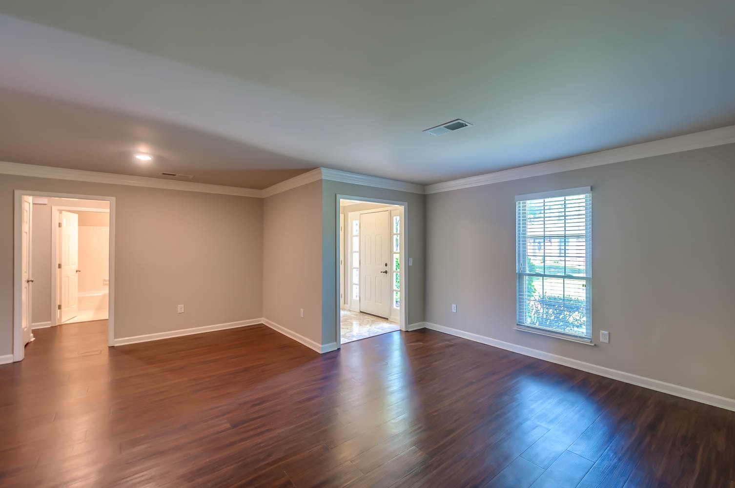 1302 General George Patton Road Nashville, TN 37221 - Photo 6 of 14 an empty room with wooden floor and windows