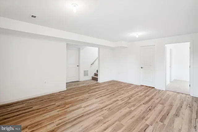 a view of a balcony with wooden floor