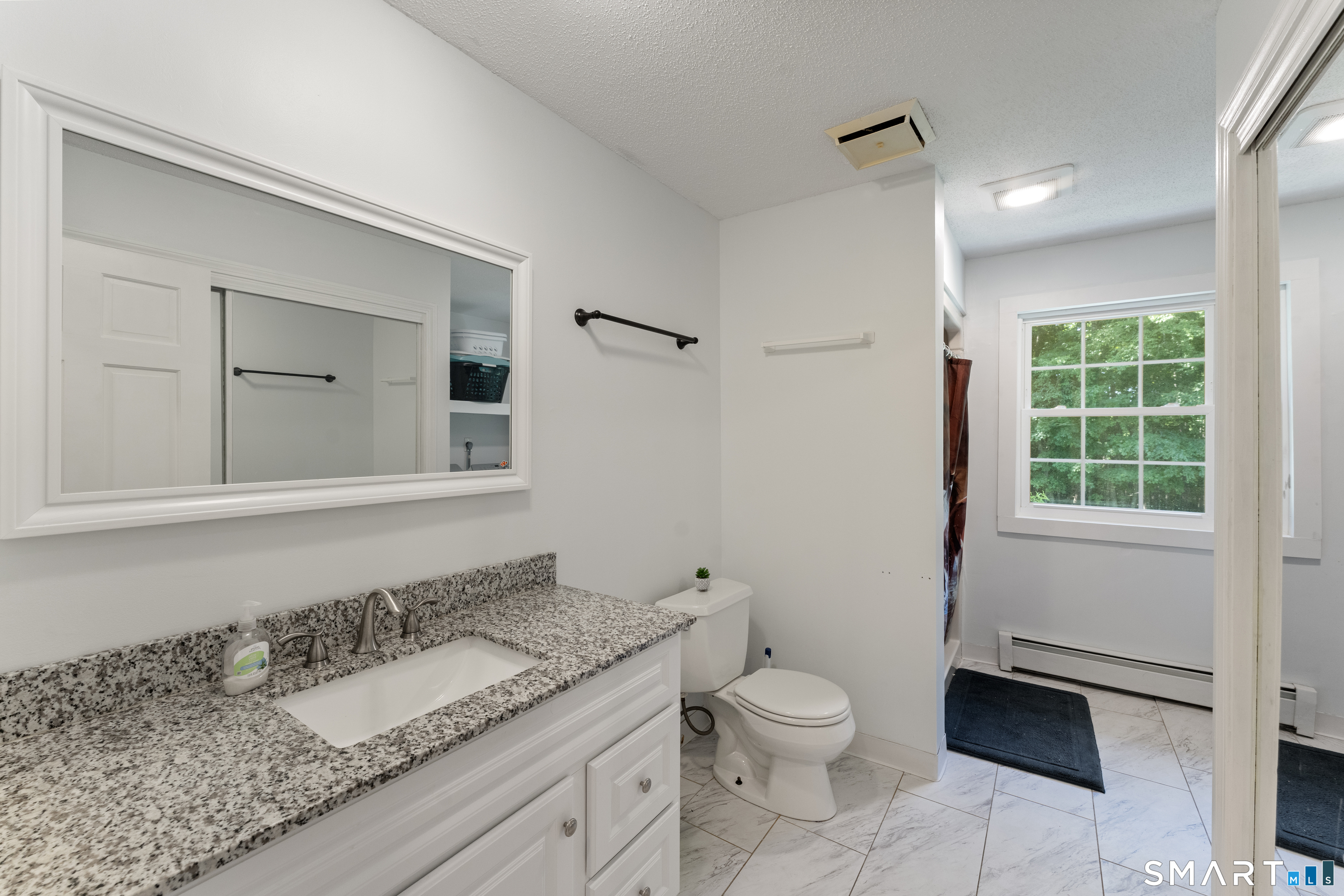 102 Pumpkin Hill Road Ashford, CT 06278 - Photo 24 of 38 Main bath with laundry