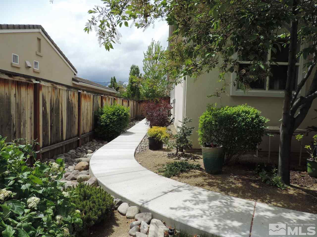 8588 Timaru Trail Reno, NV 89523 - Photo 15 of 25 a view of a backyard with plants