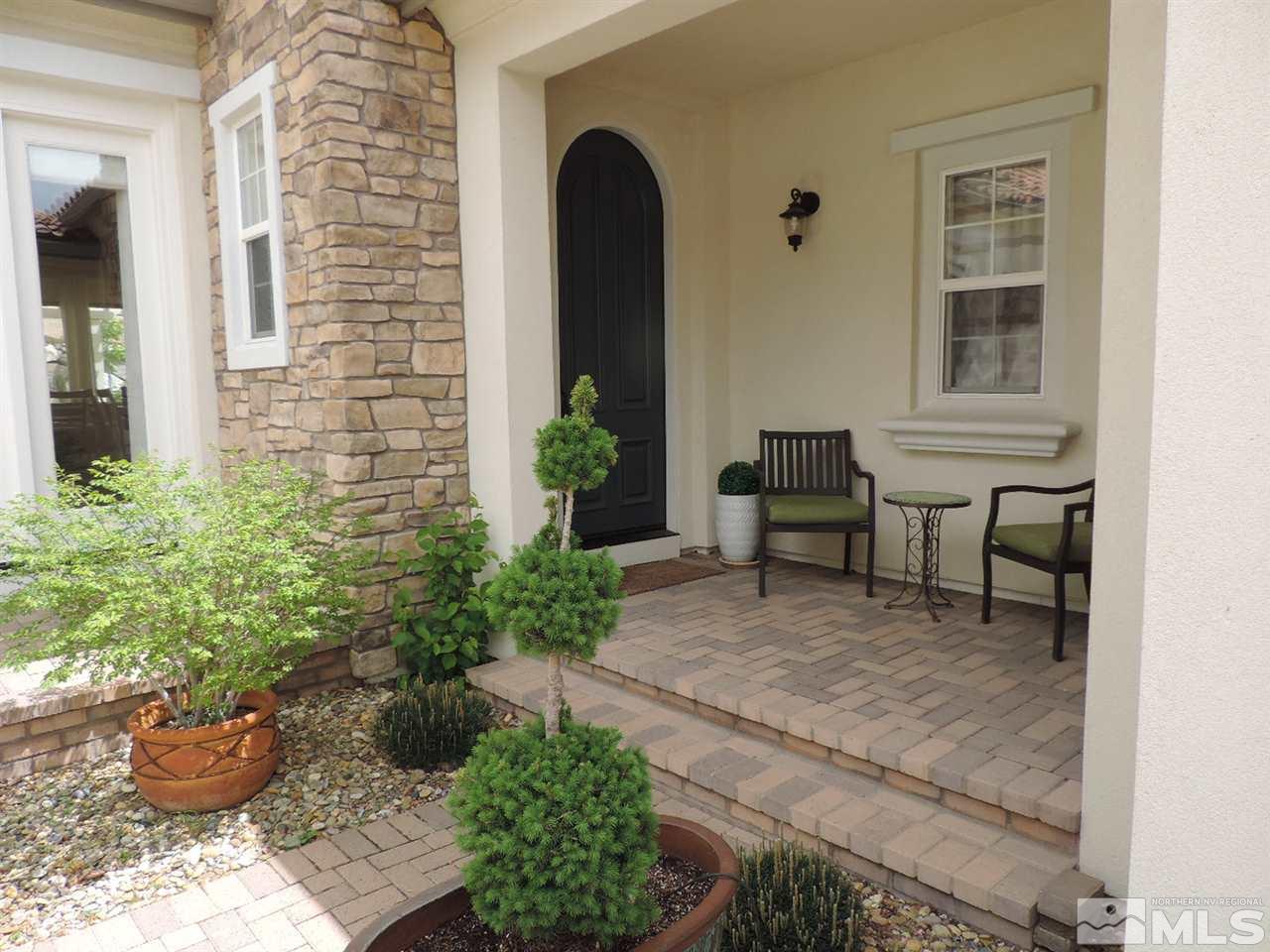 8588 Timaru Trail Reno, NV 89523 - Photo 18 of 25 a view of a entryway with flower pots