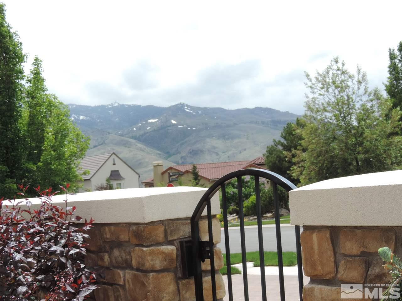 8588 Timaru Trail Reno, NV 89523 - Photo 22 of 25 a view of a patio with a table and chairs