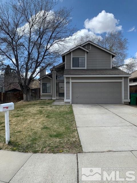 1775 Amarak Way Reno, NV 89523 - Photo 1 of 17 a front view of a house with garden