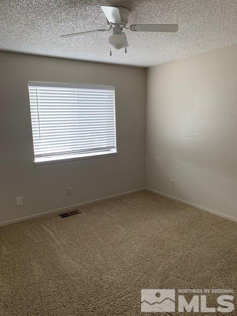 1775 Amarak Way Reno, NV 89523 - Photo 8 of 17 an empty room with a window