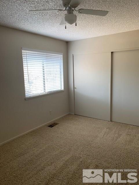 1775 Amarak Way Reno, NV 89523 - Photo 10 of 17 an empty room with a window