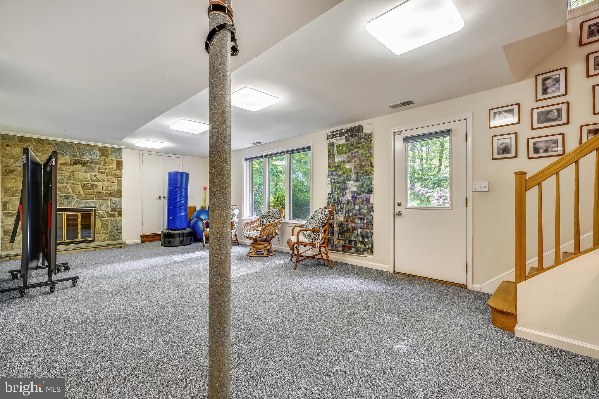 6517 Wiscasset Road Bethesda, MD 20816 - Photo 36 of 51 Recreation Room with Stone Fireplace