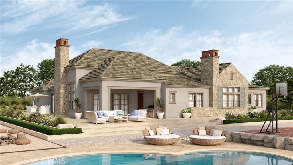 1636 Brasada Lane San Dimas, CA 91773 - Photo 2 of 8 a view of a white house with couches table and chairs