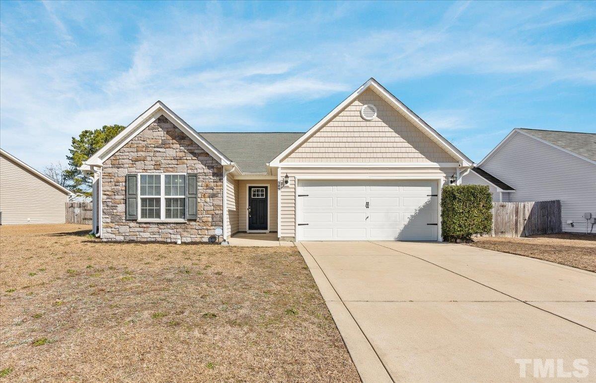 549 Cape Fear Road Raeford, NC 28376 - Photo 1 of 27 a front view of a house with a yard