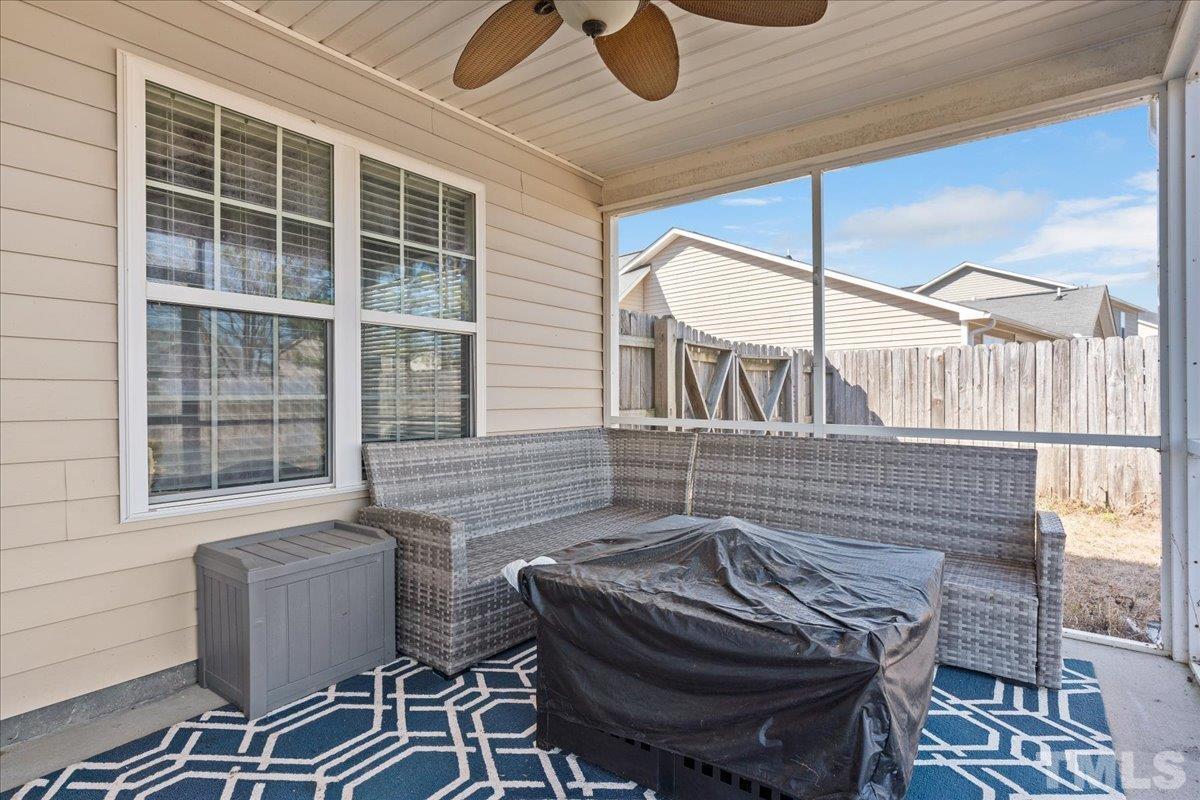 549 Cape Fear Road Raeford, NC 28376 - Photo 23 of 27 a view of a patio with a table and chairs