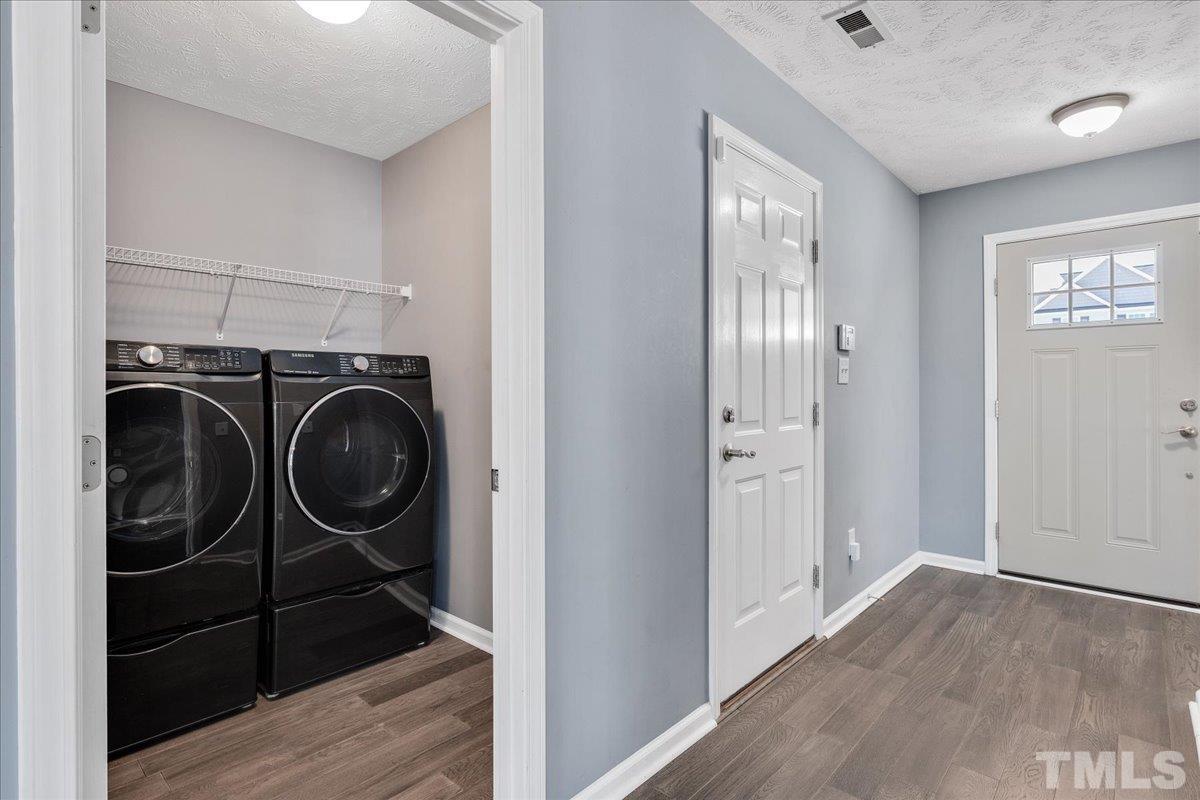549 Cape Fear Road Raeford, NC 28376 - Photo 8 of 27 a view of a hallway with washer and dryer