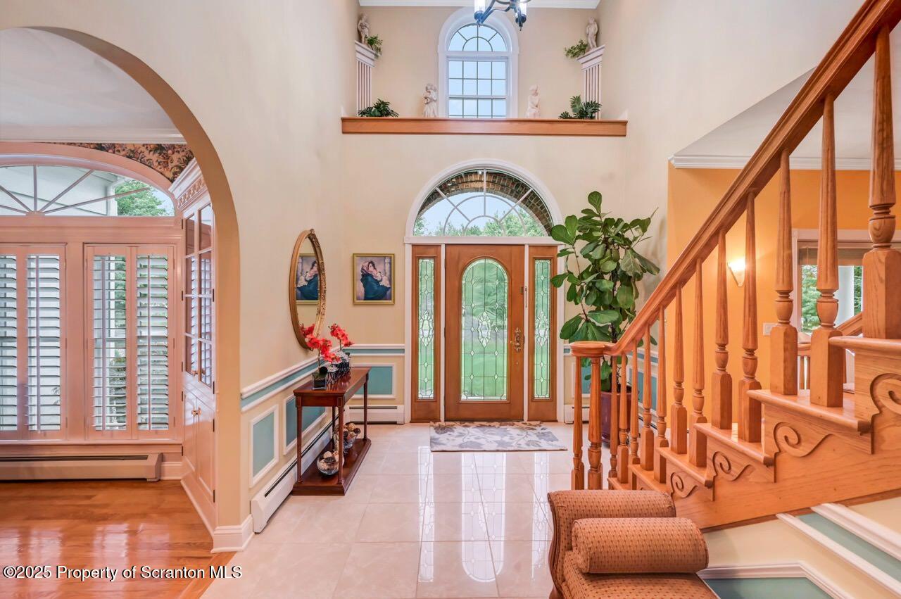 922 Old Logger Road Moscow, PA 18444 - Photo 13 of 93 a view of living room with furniture and large windows