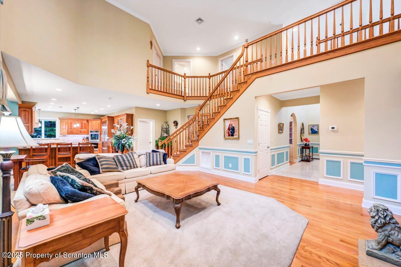 922 Old Logger Road Moscow, PA 18444 - Photo 17 of 93 a living room with lots of furniture and a table