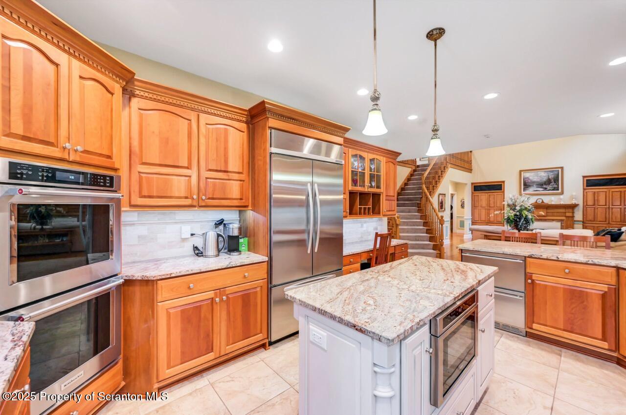 922 Old Logger Road Moscow, PA 18444 - Photo 28 of 93 a kitchen with a stove sink and microwave
