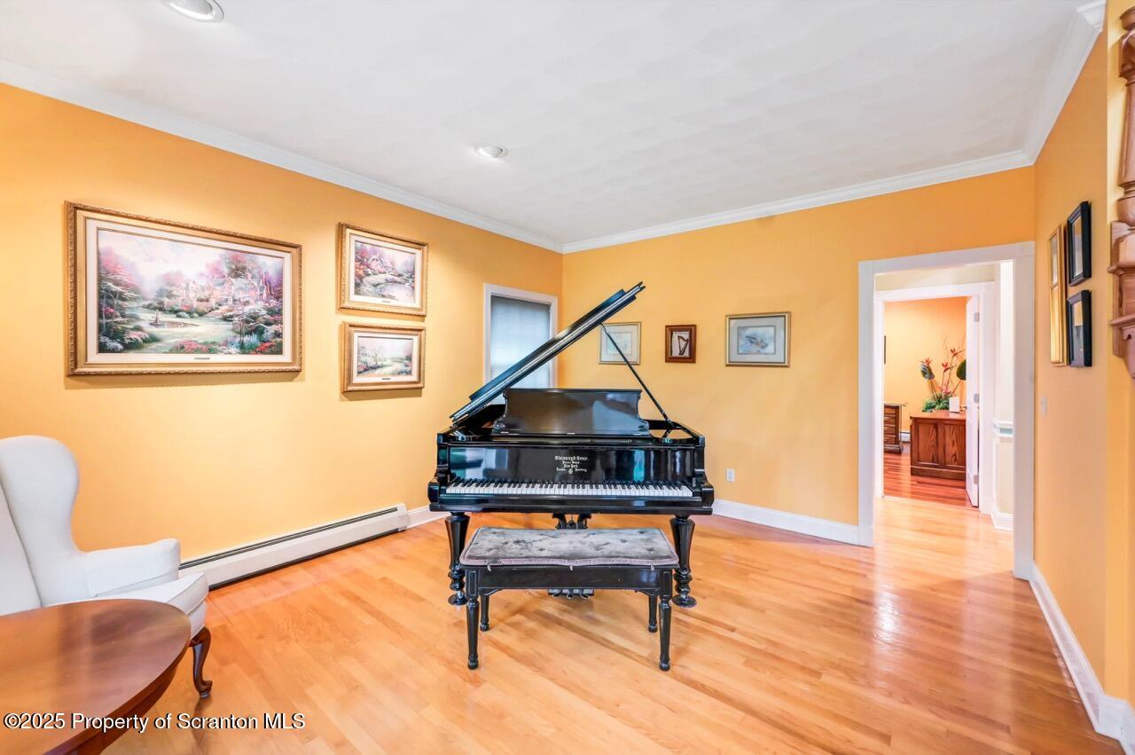 922 Old Logger Road Moscow, PA 18444 - Photo 34 of 93 a bedroom with furniture and wooden floor