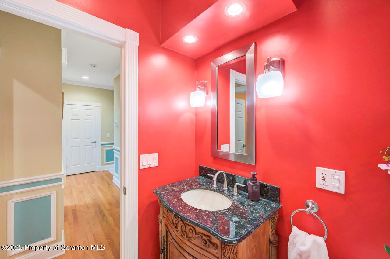 922 Old Logger Road Moscow, PA 18444 - Photo 37 of 93 a bathroom with a granite countertop sink and a mirror