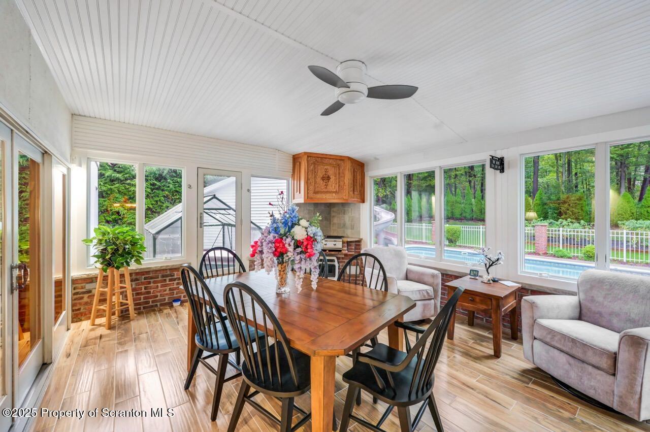 922 Old Logger Road Moscow, PA 18444 - Photo 40 of 93 a view of a dining room with furniture window and outside view