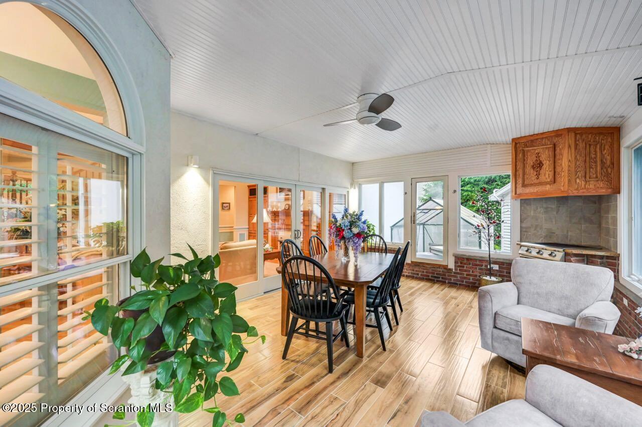 922 Old Logger Road Moscow, PA 18444 - Photo 42 of 93 a view of a dining room with furniture window and outside view