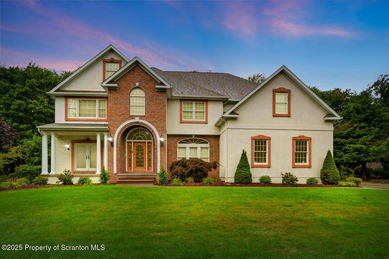 922 Old Logger Road Moscow, PA 18444 - Photo 8 of 93 a front view of a house with a yard