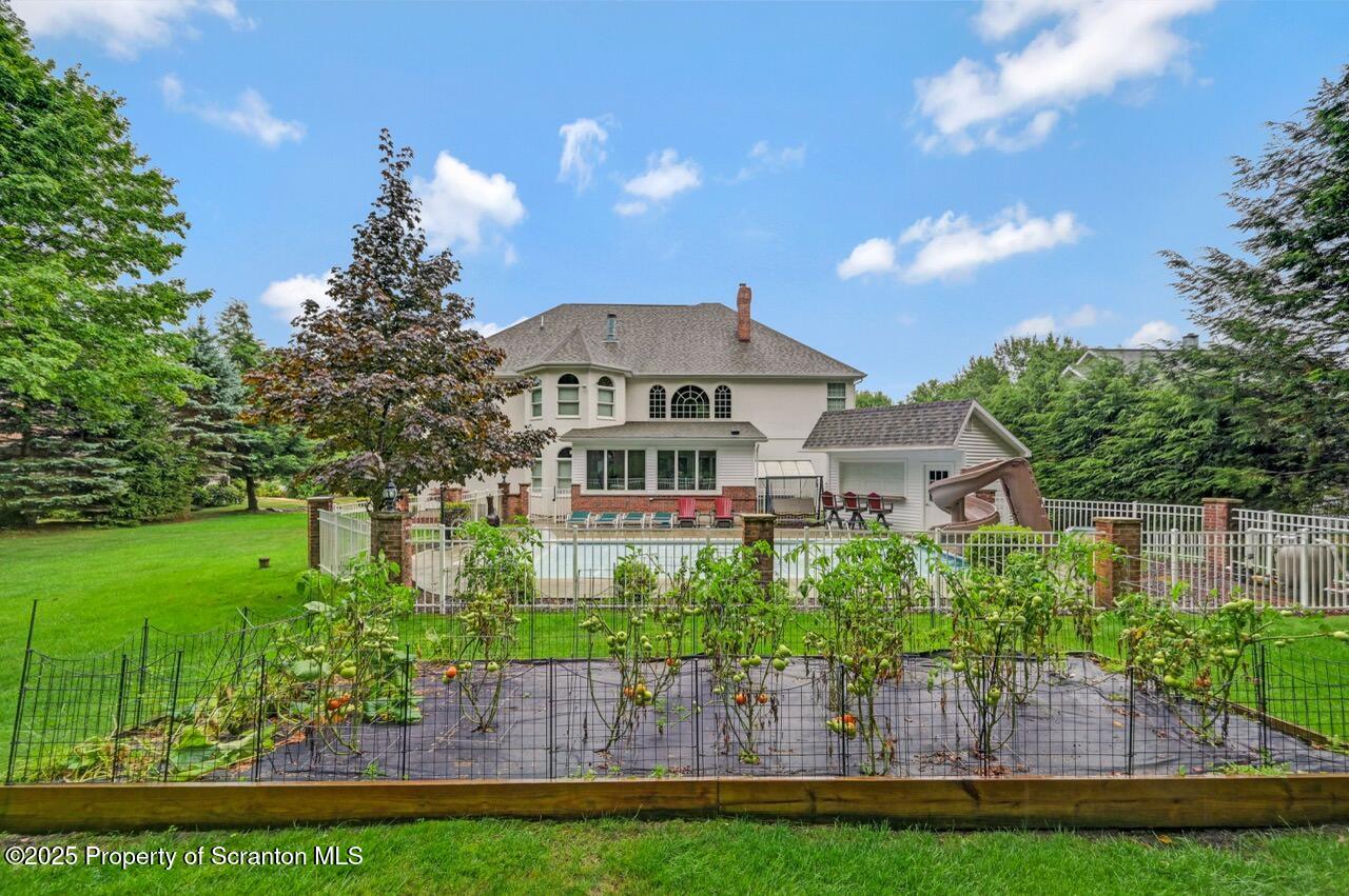 922 Old Logger Road Moscow, PA 18444 - Photo 92 of 93 a front view of a house with a yard