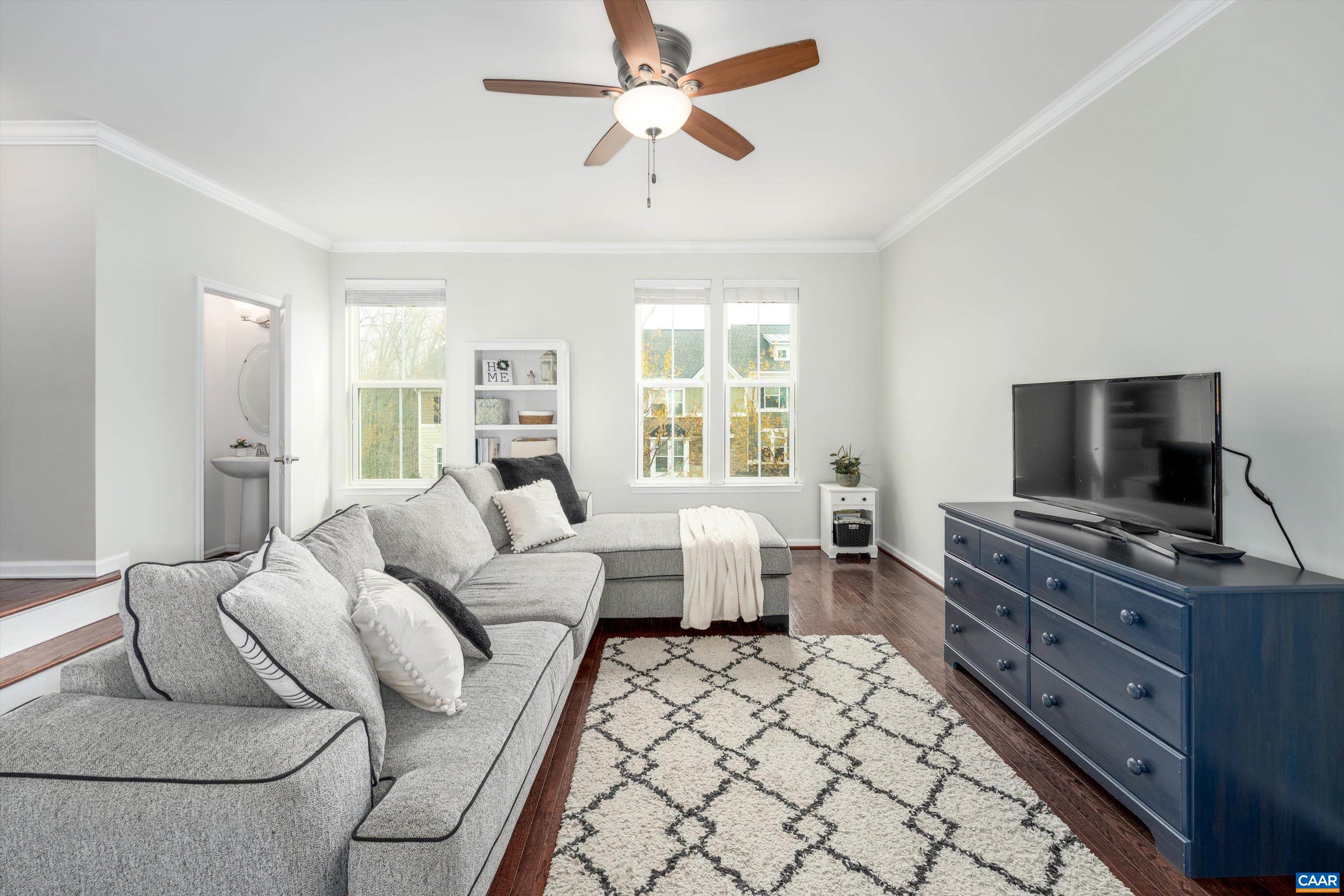 239 Pebble Beach Court Charlottesville, VA 22901 - Photo 13 of 57 a living room with furniture and a flat screen tv