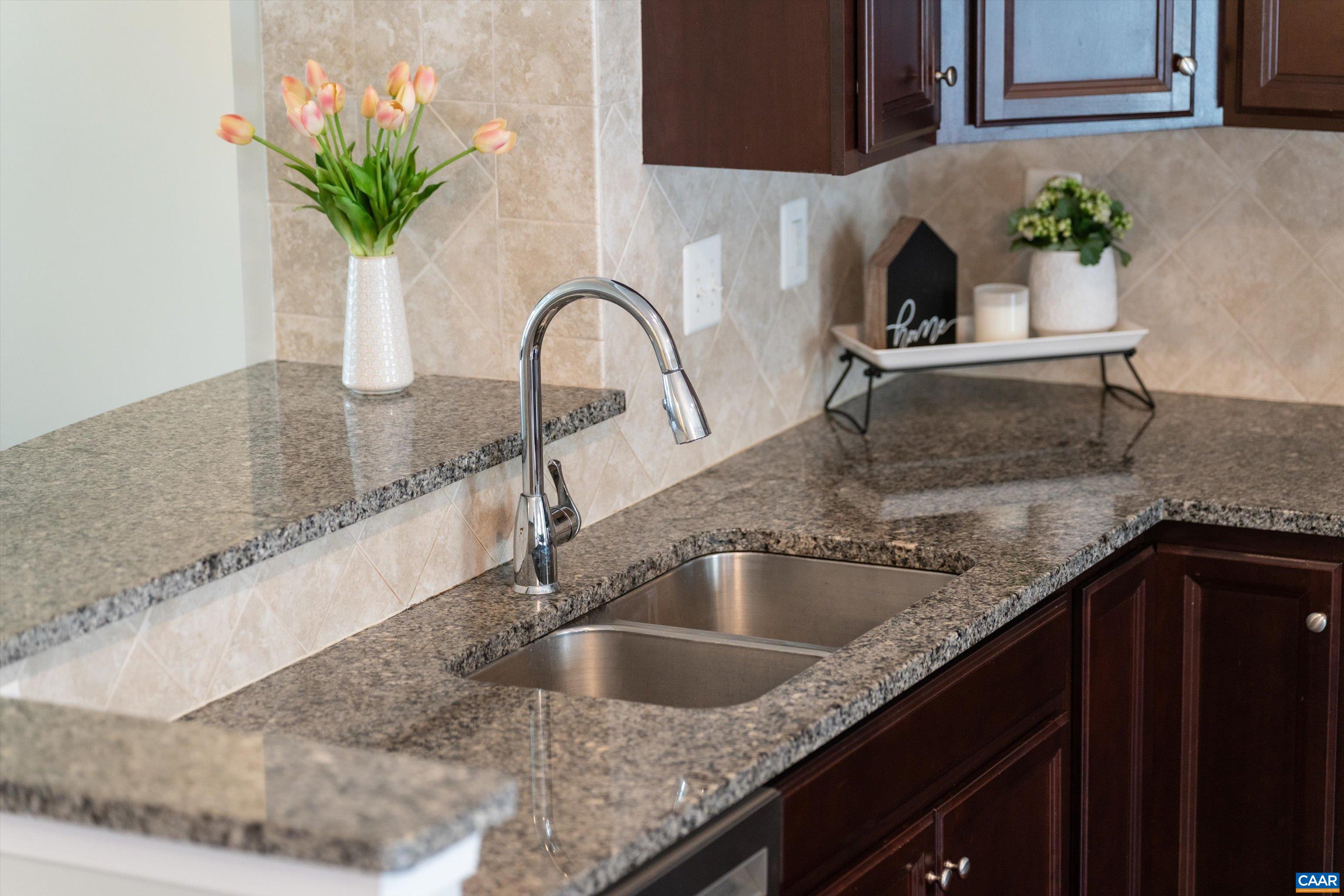 239 Pebble Beach Court Charlottesville, VA 22901 - Photo 17 of 57 a kitchen with granite countertop a sink and a granite counter tops