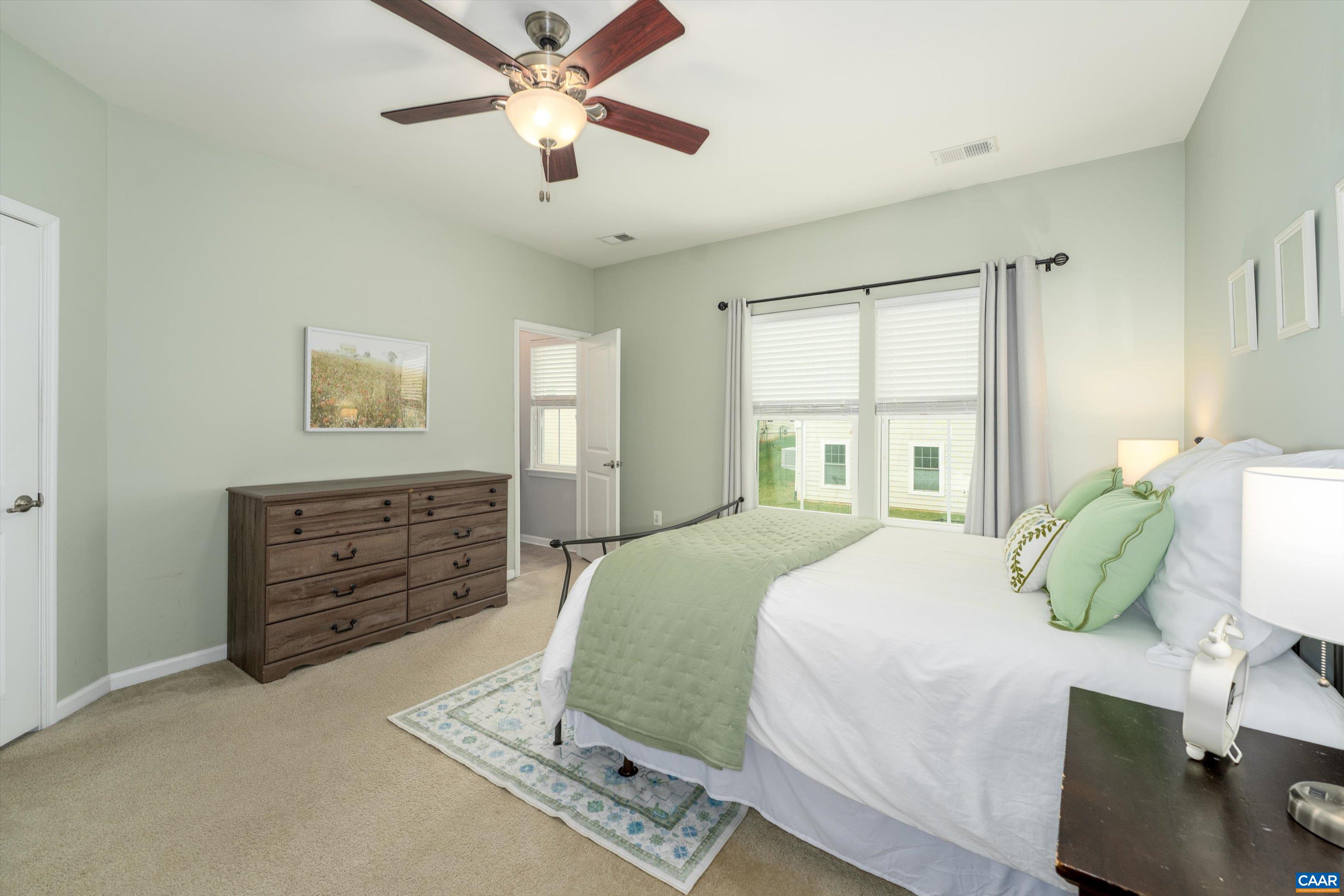 239 Pebble Beach Court Charlottesville, VA 22901 - Photo 30 of 57 a bedroom with a bed dresser and a window
