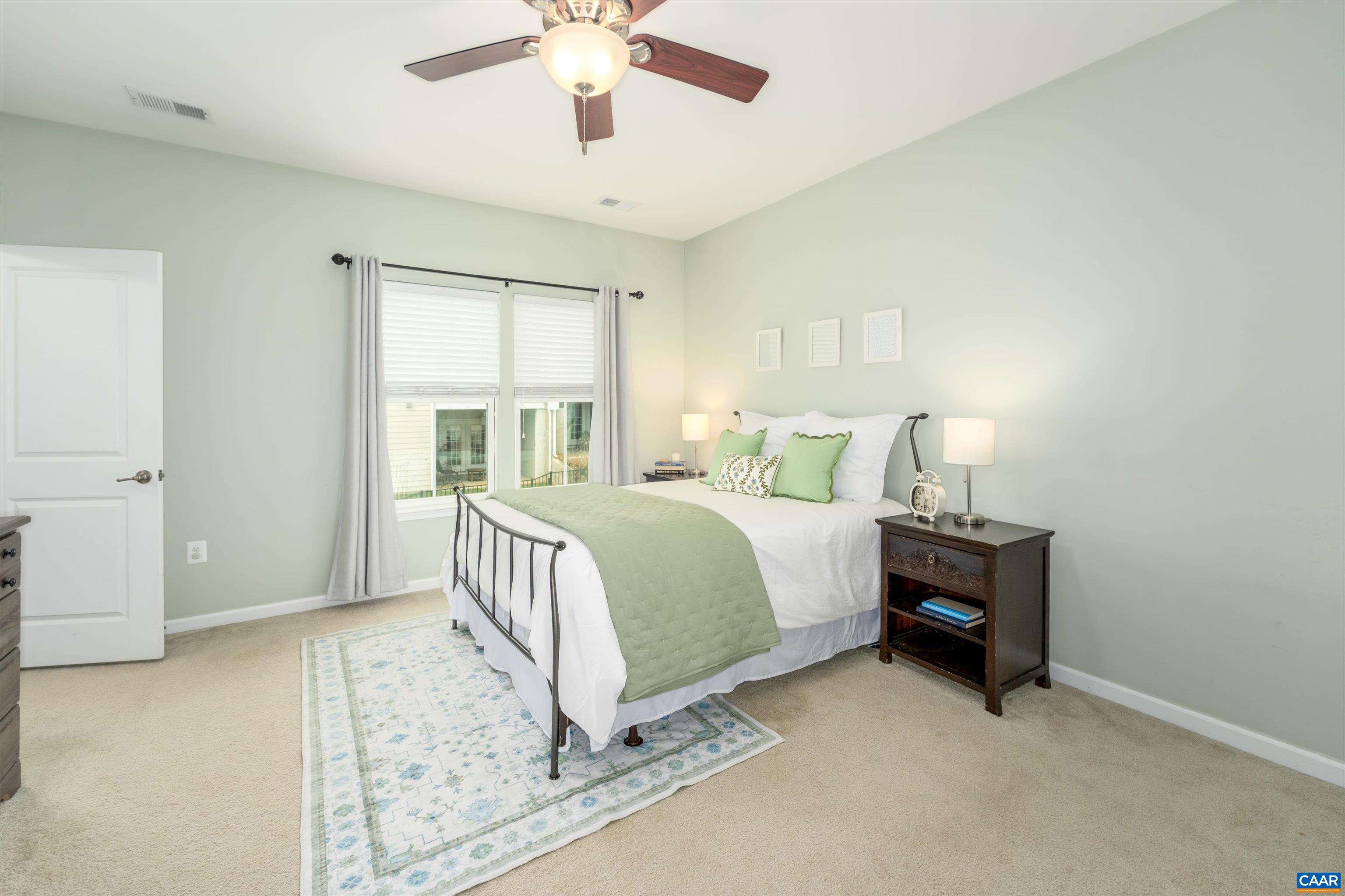 239 Pebble Beach Court Charlottesville, VA 22901 - Photo 3 of 57 a bedroom with a bed and a large window