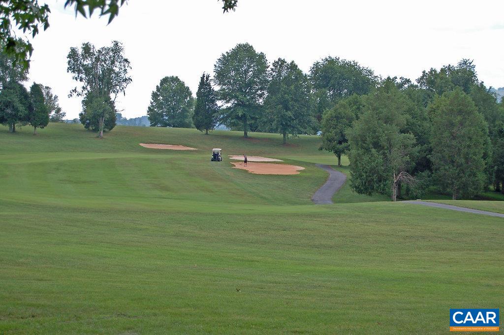 239 Pebble Beach Court Charlottesville, VA 22901 - Photo 56 of 57 a view of a golf course with a lake