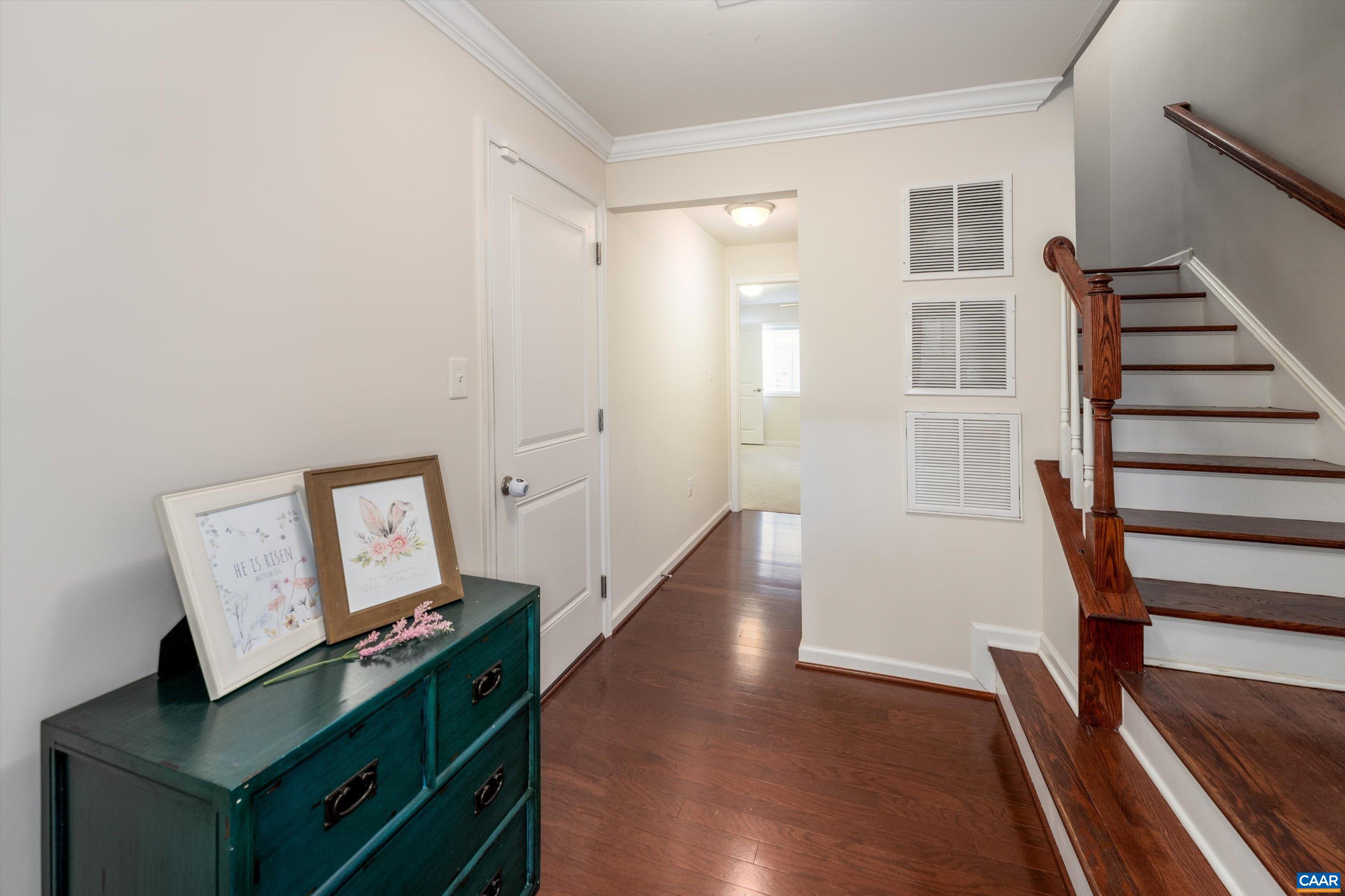 239 Pebble Beach Court Charlottesville, VA 22901 - Photo 9 of 57 a view of a hallway with workspace and wooden floor