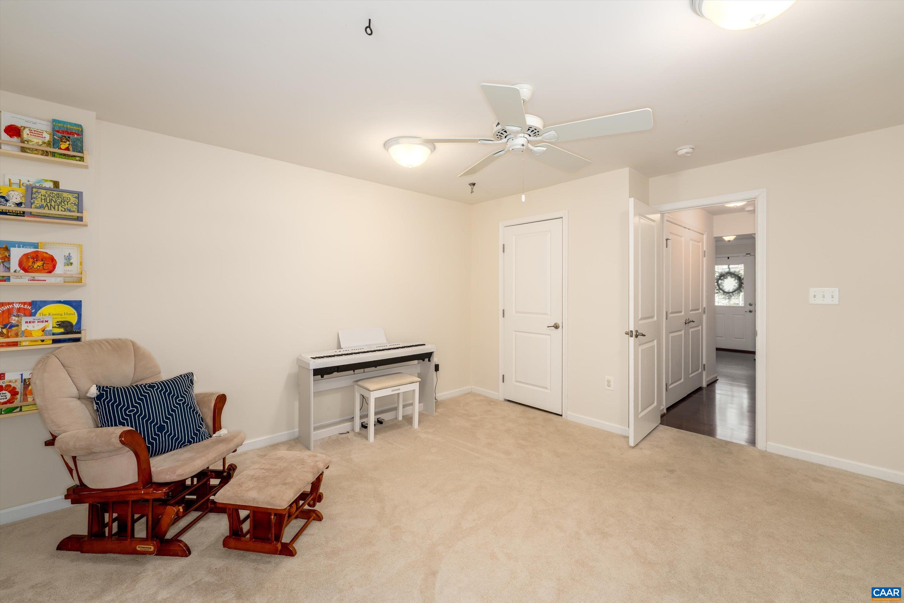 239 Pebble Beach Court Charlottesville, VA 22901 - Photo 10 of 57 a bedroom with furniture and a chandelier fan