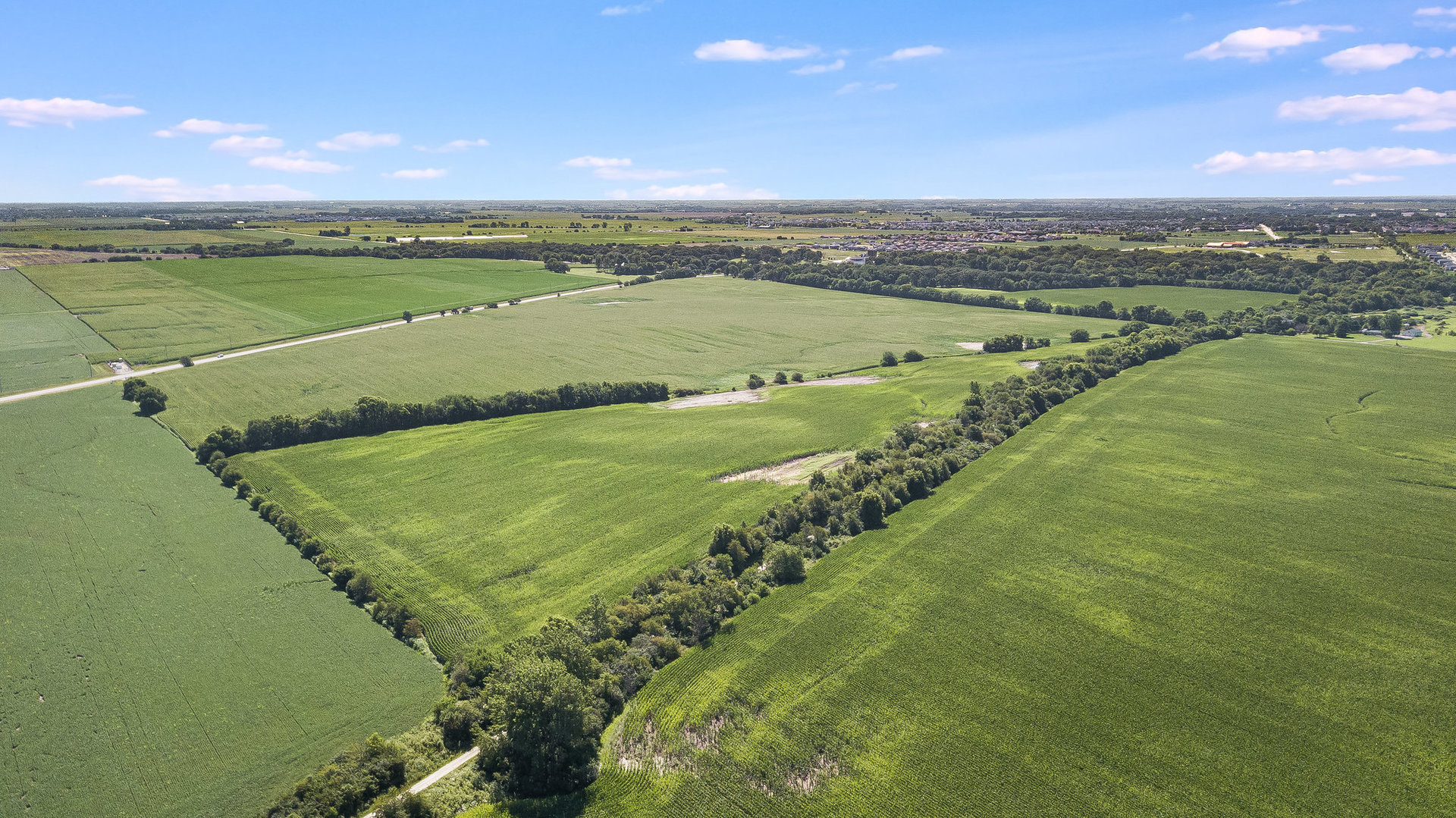 1111 West Baker Road Manhattan, IL 60442 - Photo 6 of 6 a view of a city and an ocean