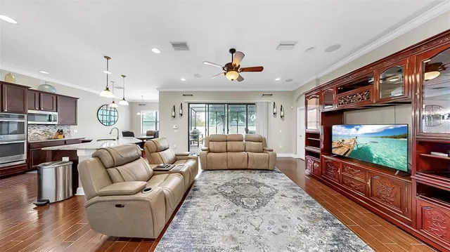 a bathroom with a granite countertop sink a toilet and a mirror