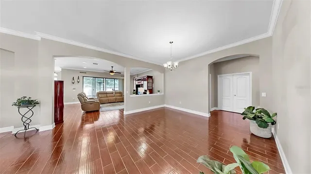 a front view of a house with a yard and a garage