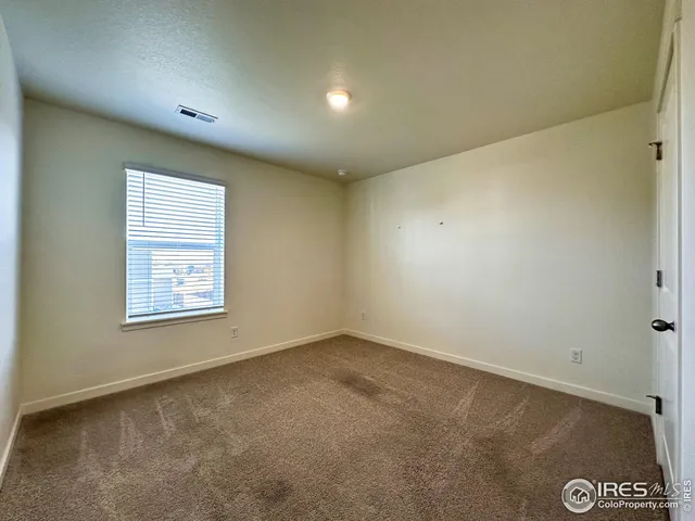 an empty room with a workbench