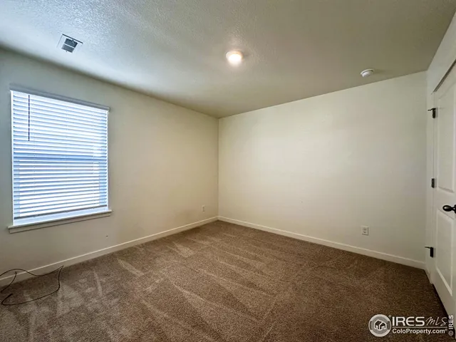 a front view of a house with swimming pool