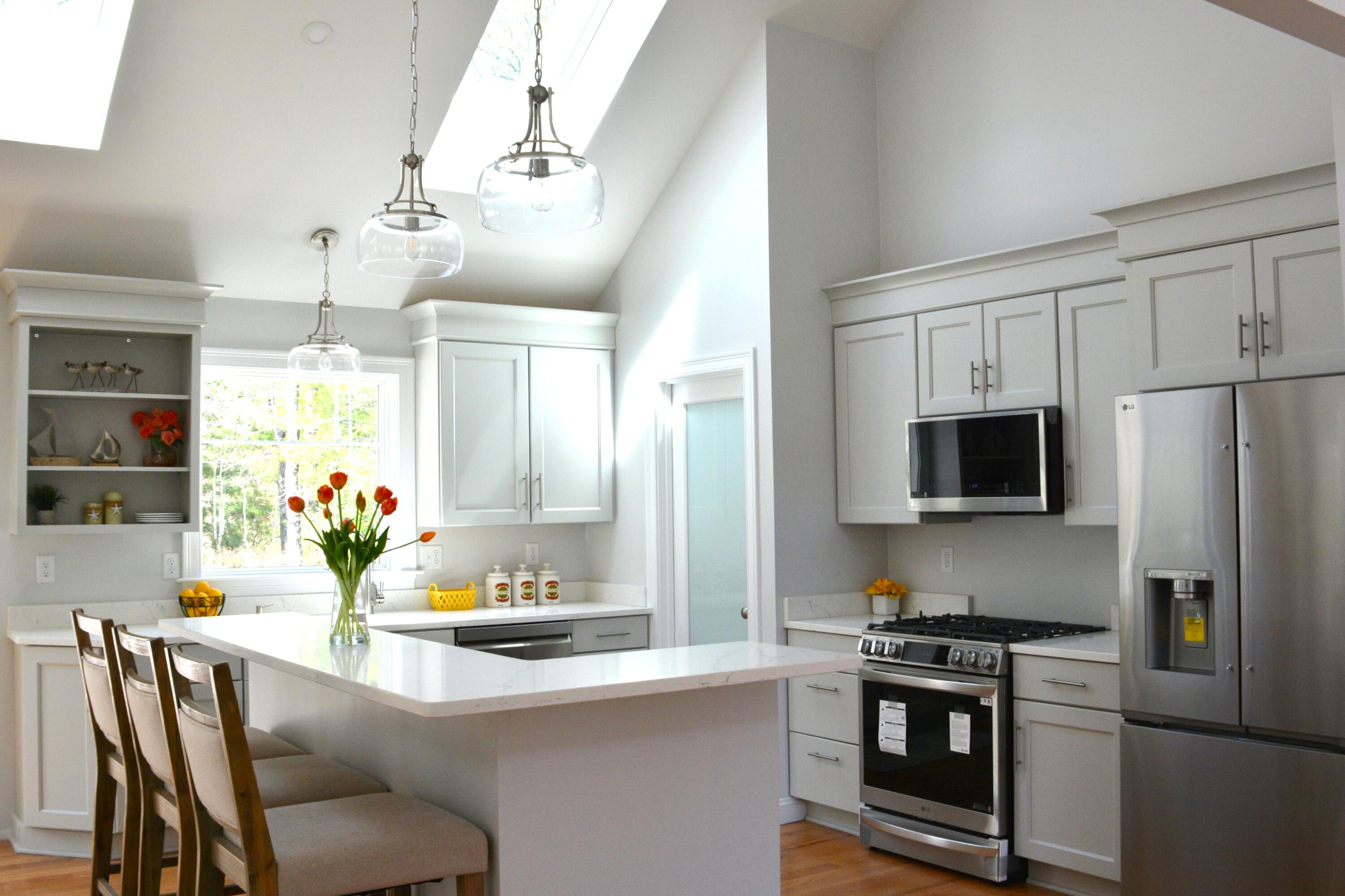 55 Blue Castle Drive Mashpee, MA 02649 - Photo 16 of 52 a view of a kitchen with microwave and cabinets