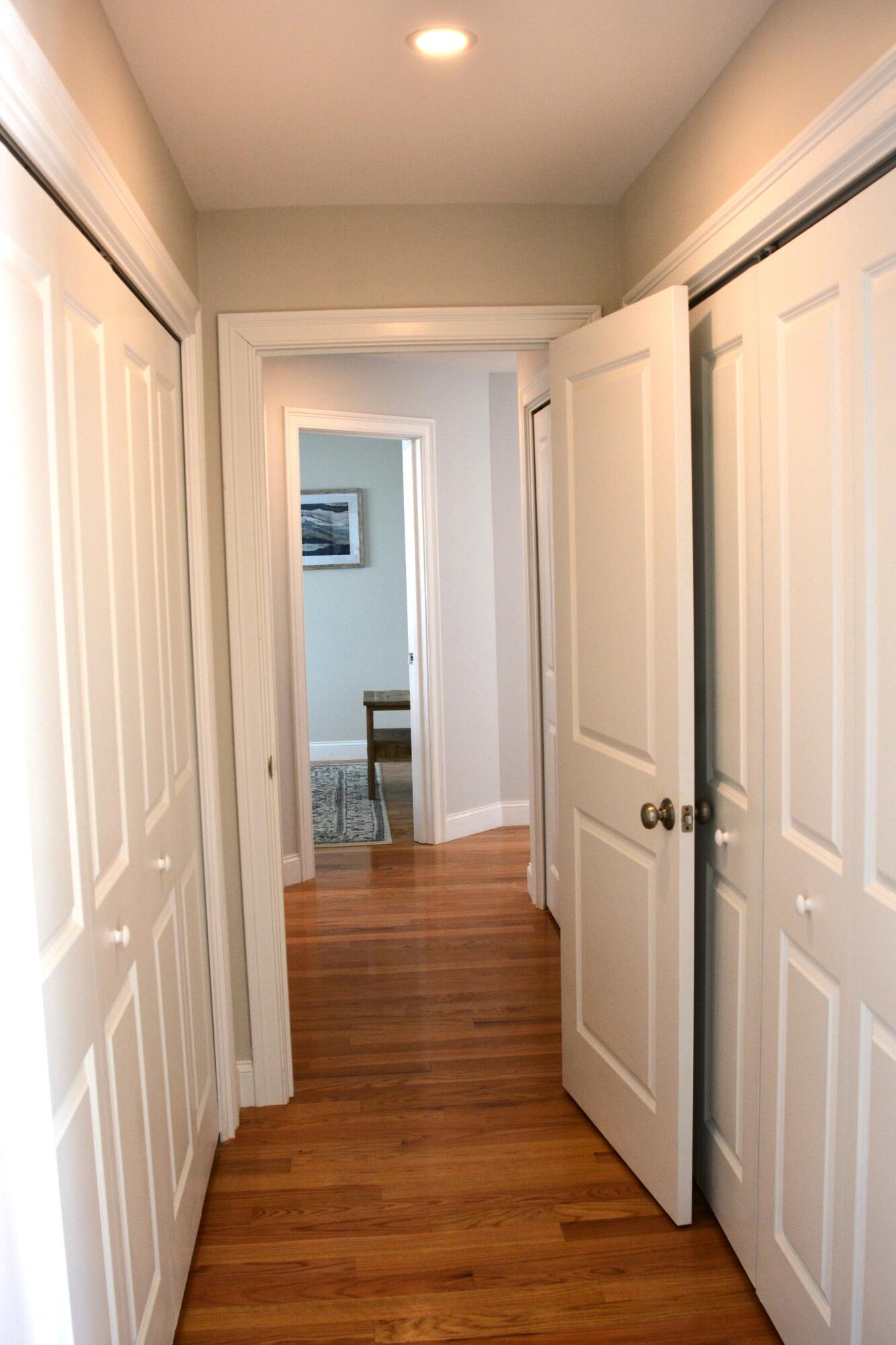 55 Blue Castle Drive Mashpee, MA 02649 - Photo 34 of 52 a view of a hallway with wooden floor and closet area