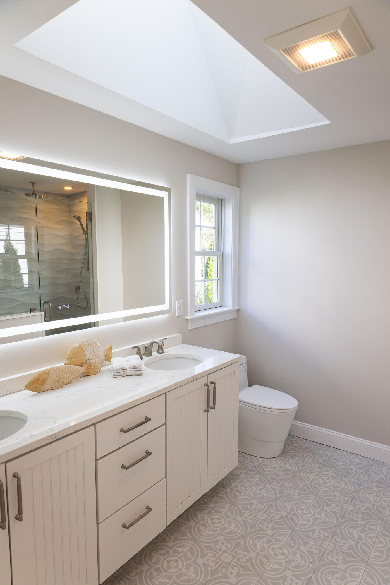 55 Blue Castle Drive Mashpee, MA 02649 - Photo 39 of 52 a bathroom with a granite countertop sink mirror and a toilet