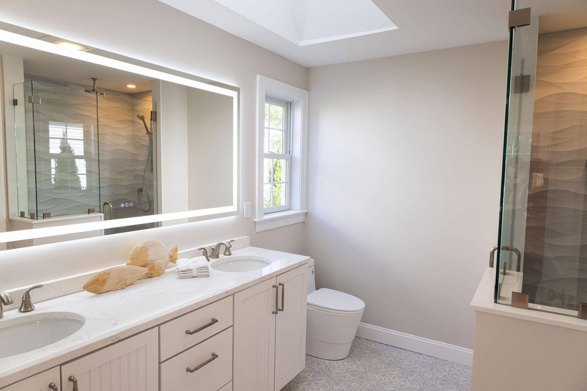 55 Blue Castle Drive Mashpee, MA 02649 - Photo 40 of 52 a bathroom with a granite countertop sink mirror and toilet