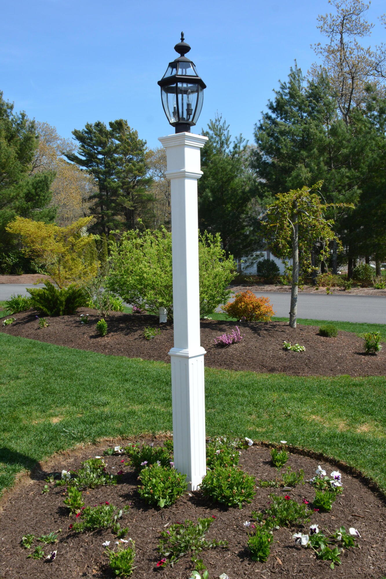 55 Blue Castle Drive Mashpee, MA 02649 - Photo 5 of 52 a street sign on the side of the park