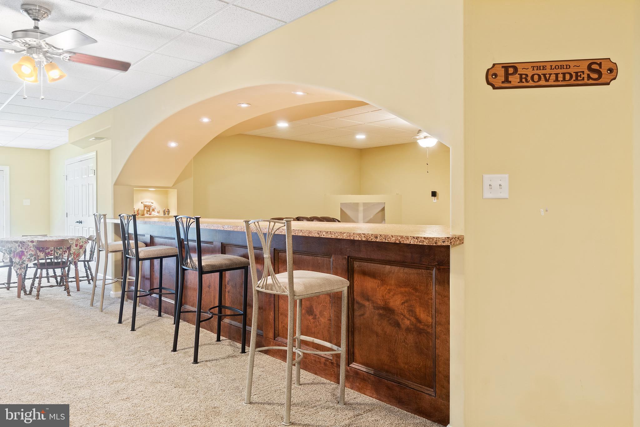 1424 Hopewell Road Port Deposit, MD 21904 - Photo 27 of 44 Beautiful bar with curved opening to den area.