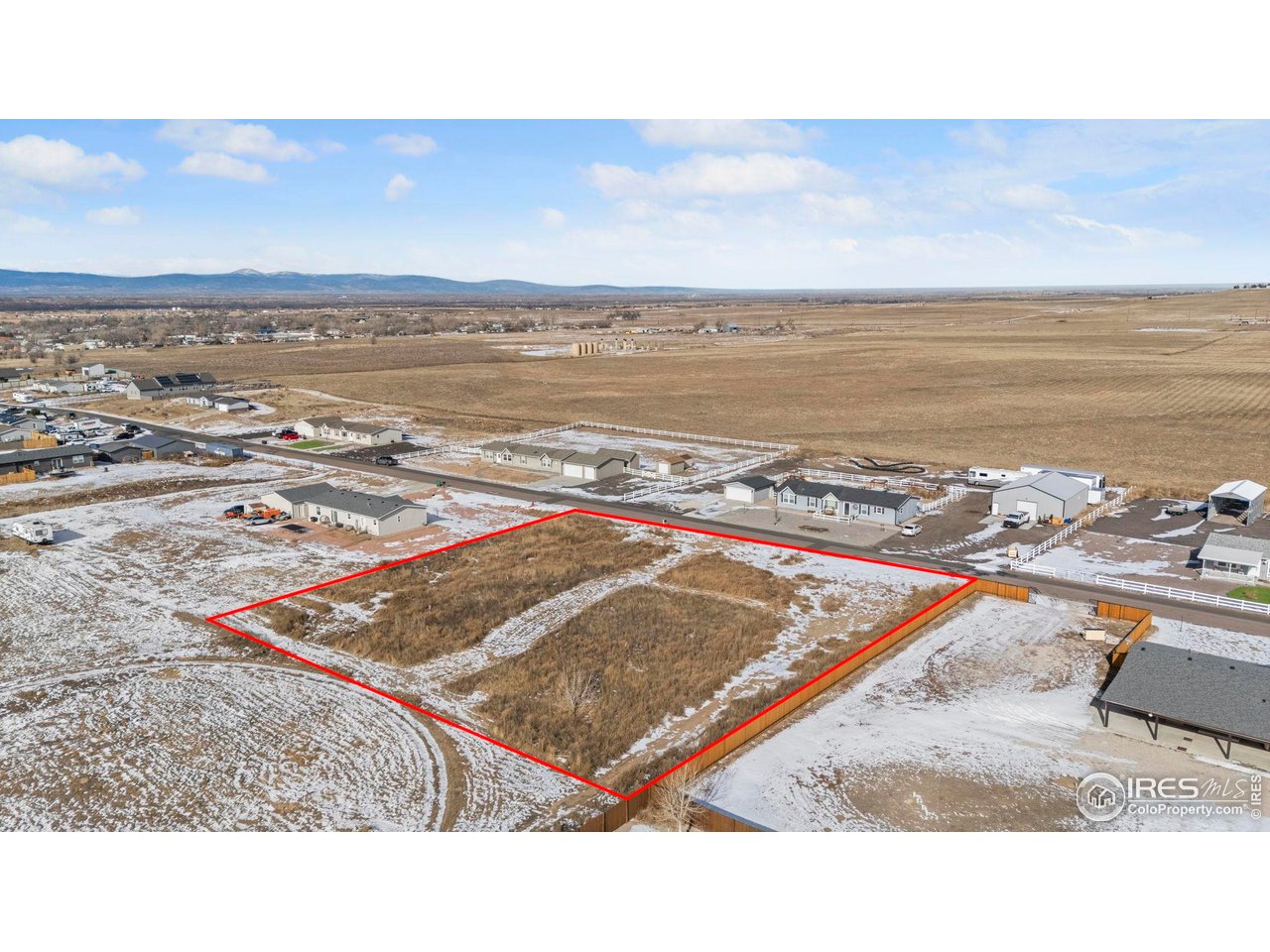 16452 Higgins Avenue Fort Lupton, CO 80621 - Photo 2 of 9 a view of an ocean beach