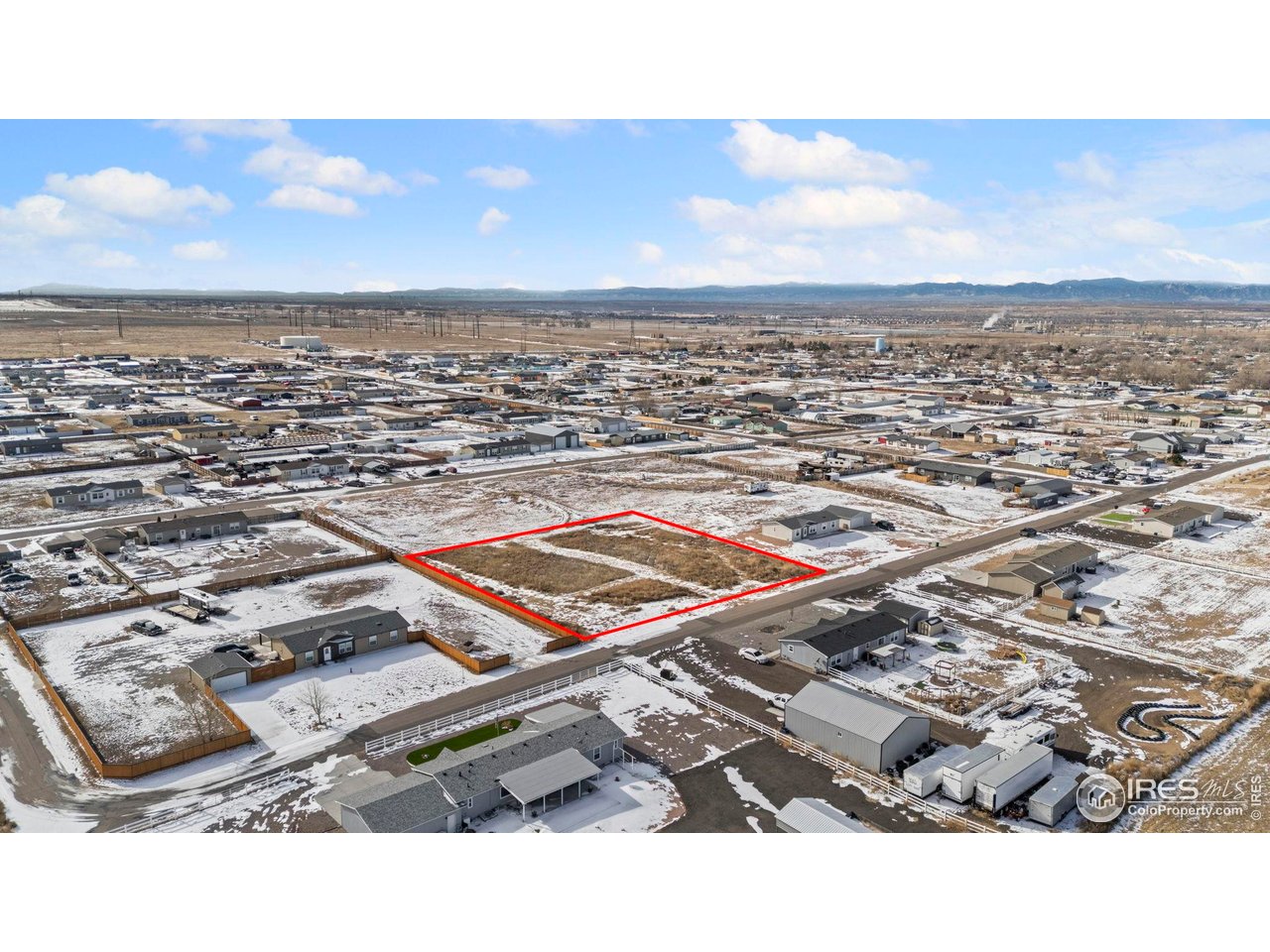 16452 Higgins Avenue Fort Lupton, CO 80621 - Photo 3 of 9 an aerial view of a city