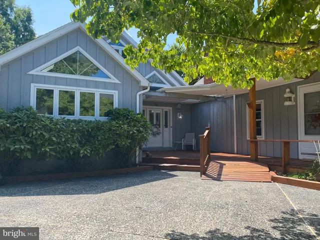 a view of a house with a porch