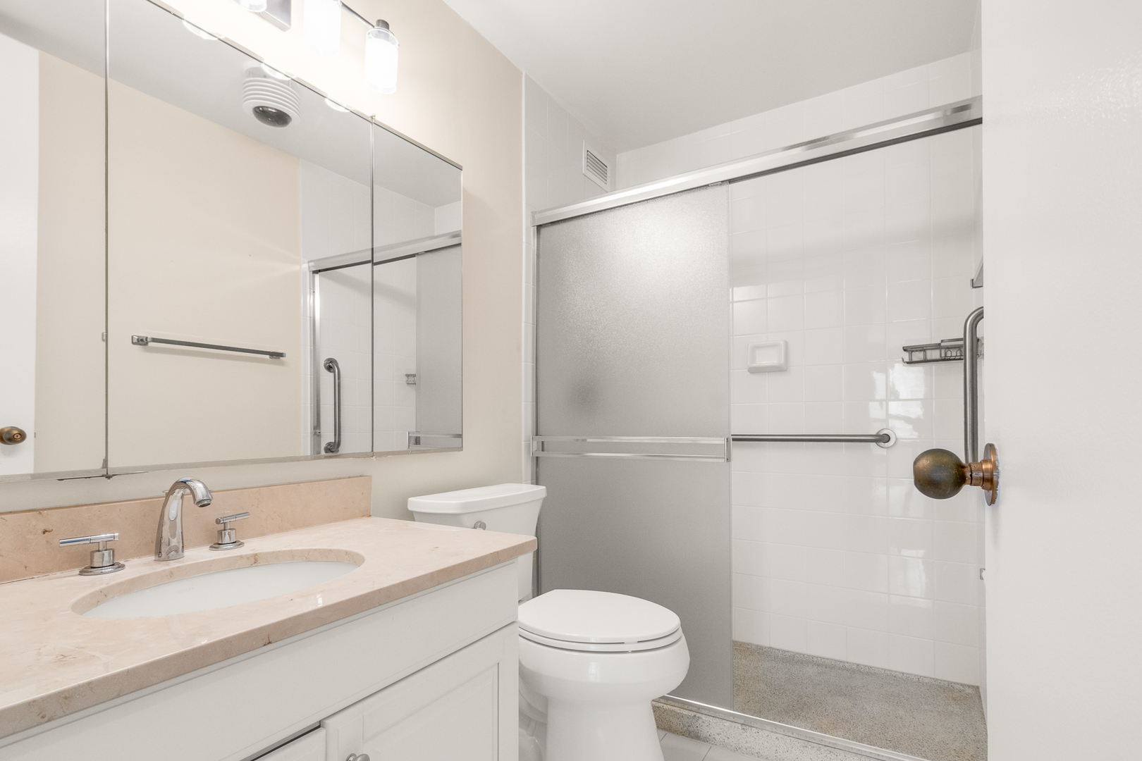 360 East Randolph Street, Unit 2307 Chicago, IL 60601 - Photo 13 of 34 a bathroom with a granite countertop sink toilet and shower