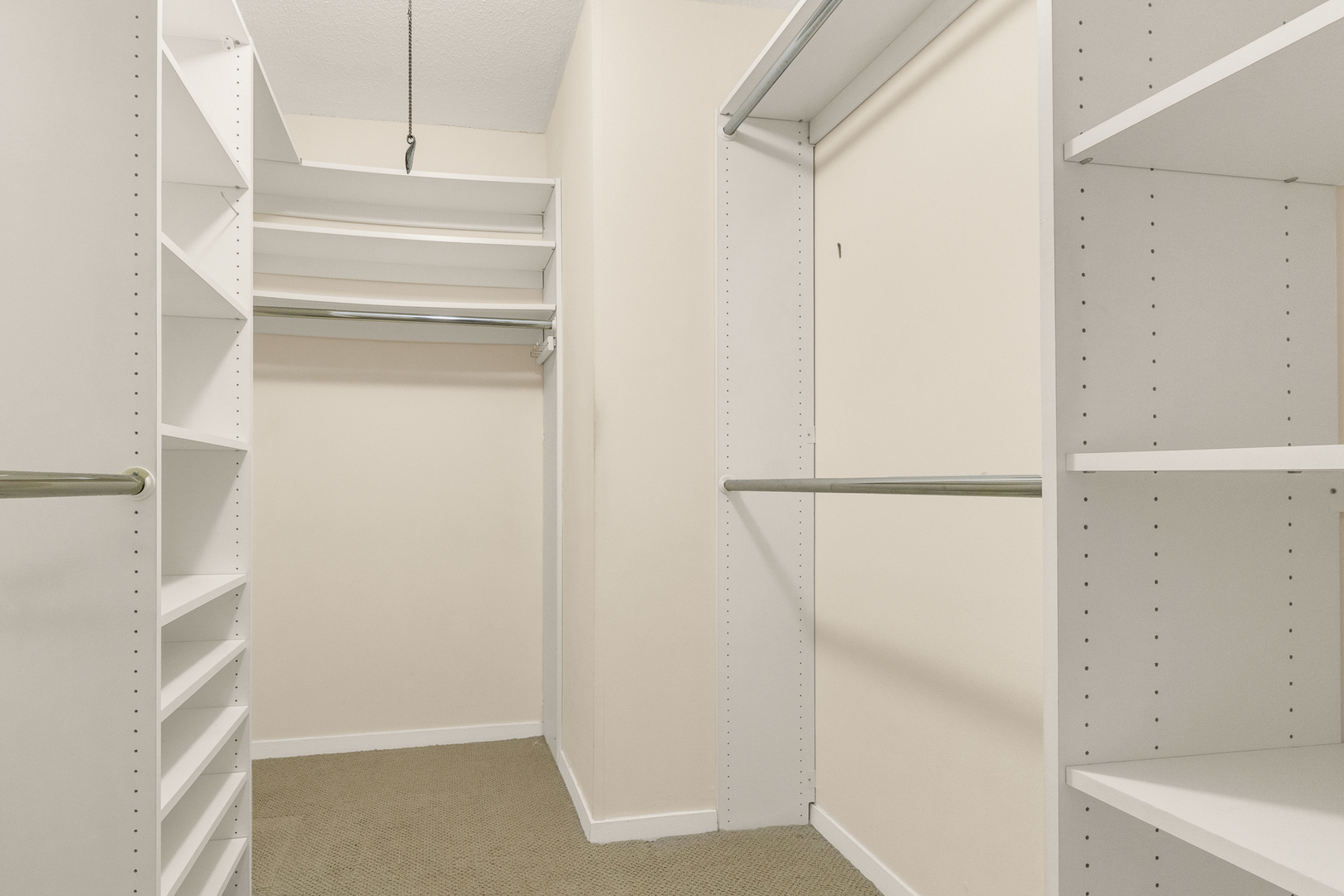 360 East Randolph Street, Unit 2307 Chicago, IL 60601 - Photo 15 of 34 a view of walk in closet with empty racks